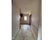 Peeling paint and dirty floors visible in this interior shot of a residential hallway at 2408 Homestead Road Rd, Chapel Hill, NC 27516