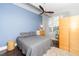 This bedroom features modern decor, a ceiling fan, and ample natural light at 300 Finsbury # 115, Durham, NC 27703