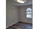 Bedroom featuring hardwood floors, natural light and neutral colors at 3616 Open Sight Ct, Raleigh, NC 27616