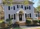 Charming two-story home with gray siding, black shutters, and a covered front porch at 3616 Open Sight Ct, Raleigh, NC 27616