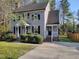 Traditional two-story home with a well-manicured lawn and inviting front entrances at 3616 Open Sight Ct, Raleigh, NC 27616