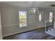Living room with new floors and a view of the front entrance at 3616 Open Sight Ct, Raleigh, NC 27616