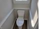 Bathroom featuring a toilet and white molding at 3616 Open Sight Ct, Raleigh, NC 27616