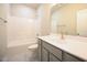 Bathroom featuring a tub and shower combo, a white vanity, and tile flooring at 400 S Eastwood Dr, Benson, NC 27504