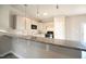 Well-equipped kitchen featuring granite countertops, stainless appliances, and ample cabinet space at 400 S Eastwood Dr, Benson, NC 27504