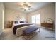 Cozy main bedroom featuring a large window for natural light and decor at 400 S Eastwood Dr, Benson, NC 27504