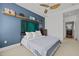 Stylish bedroom includes a decorative headboard, modern furnishings, and shelving at 400 W North St # 900, Raleigh, NC 27603