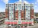Spacious building with red awnings offers a modern urban living experience in a prime location at 400 W North St # 900, Raleigh, NC 27603
