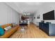 Spacious living area featuring hardwood floors and an open layout with modern decor at 400 W North St # 900, Raleigh, NC 27603