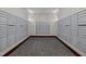 Mailbox area featuring multiple secure mailboxes, carpeted floor and good lighting at 400 W North St # 900, Raleigh, NC 27603