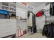 Organized walk-in closet features ample shelving, drawers, and hanging space at 400 W North St # 900, Raleigh, NC 27603