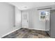 Bright basement with a door to the exterior and slate tile flooring at 409 Dartmouth Rd, Raleigh, NC 27609