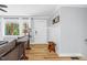 Cozy living room features hardwood floors, natural light from the windows, and a warm, inviting atmosphere at 409 Dartmouth Rd, Raleigh, NC 27609