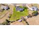 Aerial view of the house with a big lawn and other outbuildings in the area at 42 Galaxy Dr, Garner, NC 27529