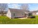 Backyard featuring a well-maintained lawn and a patio at 42 Galaxy Dr, Garner, NC 27529
