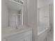 Bright bathroom with white vanity, shower, and tile flooring at 42 Galaxy Dr, Garner, NC 27529