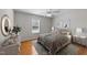 Bedroom with hardwood floors, ceiling fan, and neutral décor at 42 Galaxy Dr, Garner, NC 27529