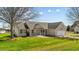 Charming single-story home features a well-manicured lawn, inviting porch, and attached two-car garage at 42 Galaxy Dr, Garner, NC 27529