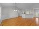 Spacious living room featuring hardwood floors and recessed lighting leads to other parts of the house at 42 Galaxy Dr, Garner, NC 27529