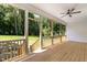 View of porch and backyard with green trees at 503 Forest Rd, Oxford, NC 27565