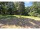 View of backyard featuring tall trees at 503 Forest Rd, Oxford, NC 27565