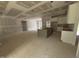 Spacious open-concept kitchen with large island, white cabinets, and abundant natural light at 503 Forest Rd, Oxford, NC 27565