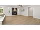 Bright, open-concept living room featuring hardwood floors, a modern fireplace, and plenty of natural light for a cozy atmosphere at 503 Forest Rd, Oxford, NC 27565