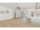 Open-concept living space with hardwood floors, stylish decor, and seamless transitions to the kitchen and other living areas at 503 Forest Rd, Oxford, NC 27565