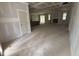 Spacious living room with fireplace and windows, ready for your personal touch at 503 Forest Rd, Oxford, NC 27565