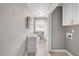 Bright bathroom featuring a vanity, tub and shower combination, and wooden-look flooring at 510 Cross St, Sanford, NC 27330