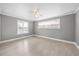 Light filled bedroom offering neutral colors and laminate floors at 510 Cross St, Sanford, NC 27330