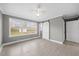 Bedroom featuring laminate flooring, a closet and barn door at 510 Cross St, Sanford, NC 27330