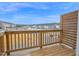 Balcony/deck with wood floor and wood panel privacy screen at 5813 Empathy Ln, Raleigh, NC 27616