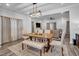 Dining area with wood table, seating for six and plenty of natural light at 5813 Empathy Ln, Raleigh, NC 27616