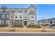 Charming townhome with stone accents and a well-manicured front yard at 5813 Empathy Ln, Raleigh, NC 27616