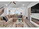 Spacious living room with a comfortable sofa, fireplace and an open layout at 5813 Empathy Ln, Raleigh, NC 27616