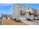 Rear exterior view with garage and upper level decks at 5813 Empathy Ln, Raleigh, NC 27616