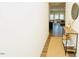 Bright entryway with wood floors, console table, and view into a spacious living area at 612 Marian Way, Sanford, NC 27330