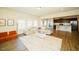 Spacious living room with modern furniture, light wood floors, and ample natural light at 612 Marian Way, Sanford, NC 27330