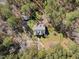 Overhead view of home with a sprawling backyard, mature trees, and detached structure at 6610 Maynard Farm Rd, Chapel Hill, NC 27516