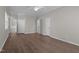 Spacious bedroom with neutral walls and three doors leading to different areas at 6610 Maynard Farm Rd, Chapel Hill, NC 27516