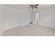 Neutral bedroom with wall-to-wall carpeting and ample doorways provides a blank canvas for personalization at 705 Prince Dr, Holly Springs, NC 27540