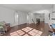 Bright upstairs hallway with hardwood floors, multiple doorways, and a staircase, ideal for Gathering living at 705 Prince Dr, Holly Springs, NC 27540