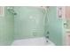 Bathroom featuring green tile shower/tub at 709 S Sellars Mill Rd, Burlington, NC 27217