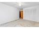 A bright bedroom with a ceiling fan and ample closet space for organized storage at 709 S Sellars Mill Rd, Burlington, NC 27217