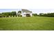 Expansive backyard showcasing lush green grass and a well-kept lawn at 71 Del Corso Ct, Clayton, NC 27527