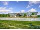 Spacious barn with riding arena and beautiful landscaping, perfect for equestrian activities at 71 Del Corso Ct, Clayton, NC 27527