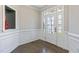 Bright foyer with hardwood floors, white trim, and a decorative niche at 71 Del Corso Ct, Clayton, NC 27527