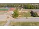 Aerial view of a school campus with parking lots and sports fields at 717 Penn Rd, Raleigh, NC 27604