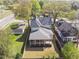 Aerial view of a home showcasing its backyard and a covered porch at 717 Penn Rd, Raleigh, NC 27604